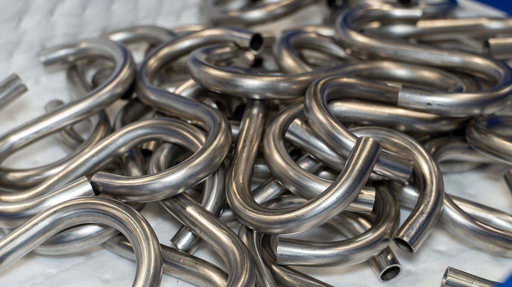 Böjda rör som representerar densitet