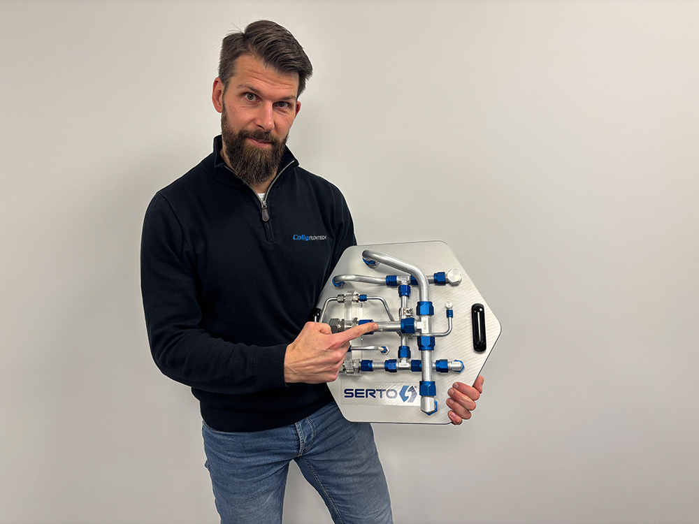 Demonstration panel featuring SERTO's tube fittings and connection technology for industrial systems.